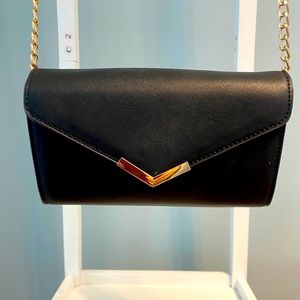 Dressy black leather crossbody/clutch bag.